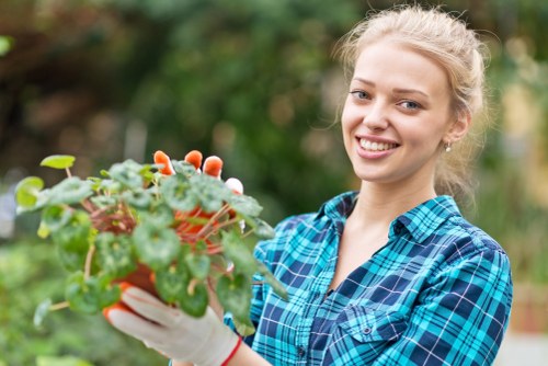 Professional gardener tending to a vibrant garden in Canning Vale