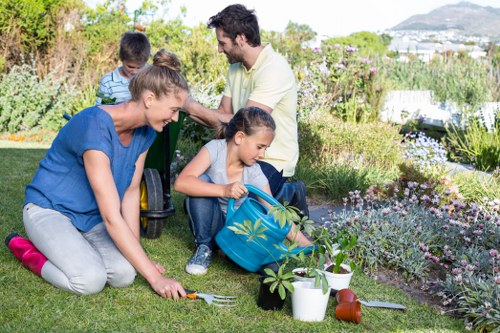 Professional gardener maintaining a lawn