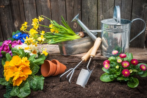 Professional gardeners working on a residential garden