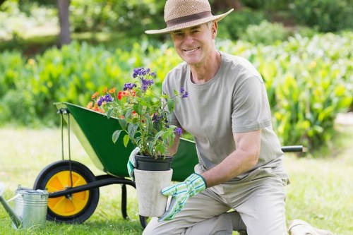 Gardeners planting colorful flowers